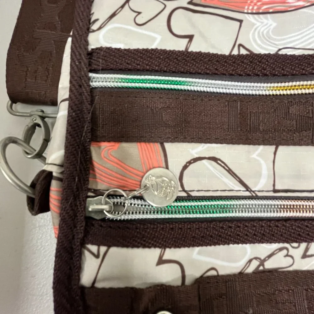 Le Sportsac computer messenger bag 11 x 15 hearts pink brown shoulder strap
